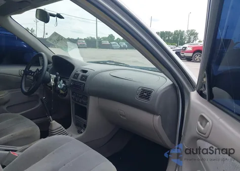 2001 Toyota Corolla Ce z USA, uszkodzony, nr VIN 2T1BR12E01C426405